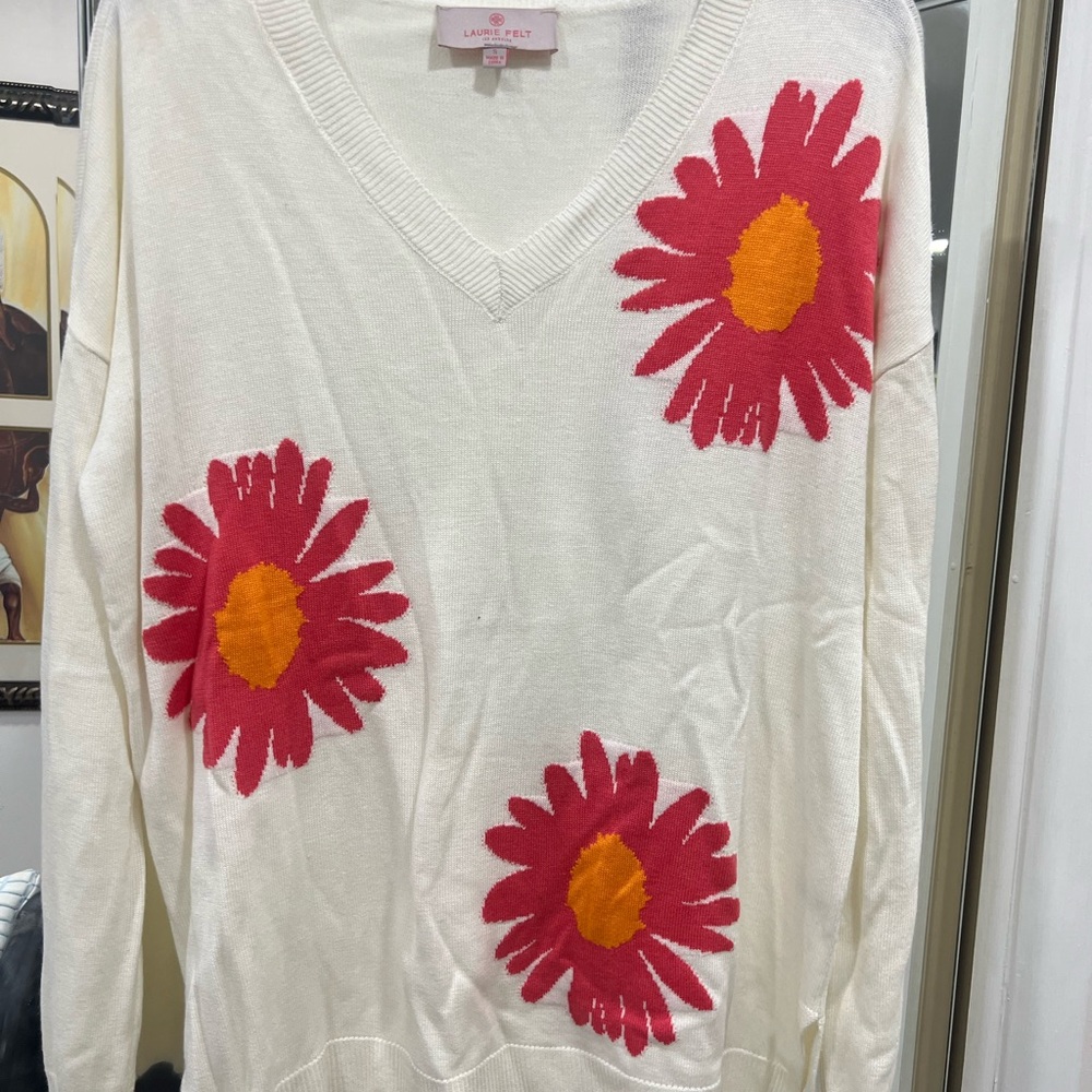 Daisy pull over sweater, thin can be worn year round.